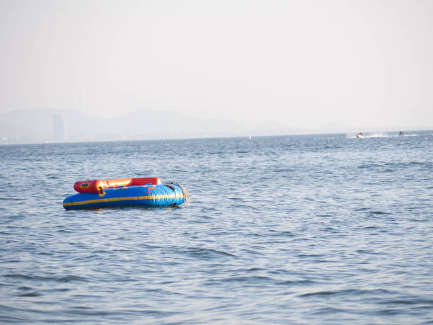 istock A rubber boat floating in the sea 1285451244