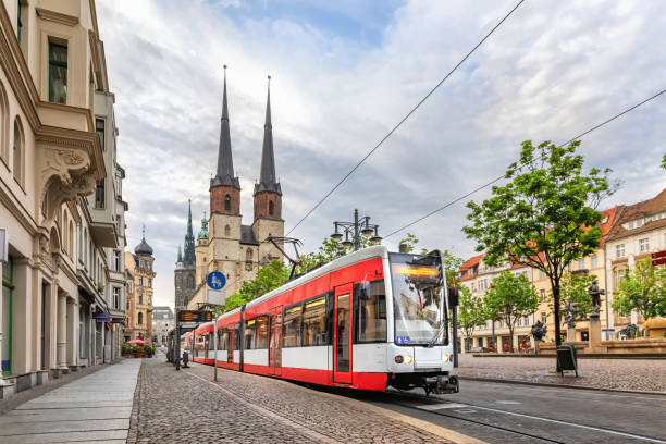 istock Red tram on Hallmarkt square in Halle (Saale), Germany 1285451317
