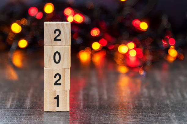 istock New Year Concept 2021 on wooden block 1285452720