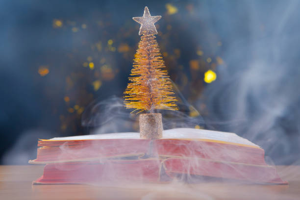 istock image of book smoke fir tree dark background 1285452732