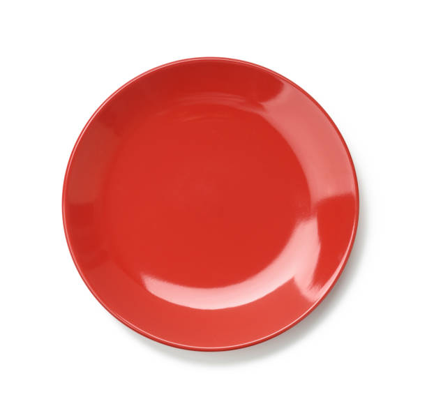 istock round red plate for main courses isolated on white background 1285454173
