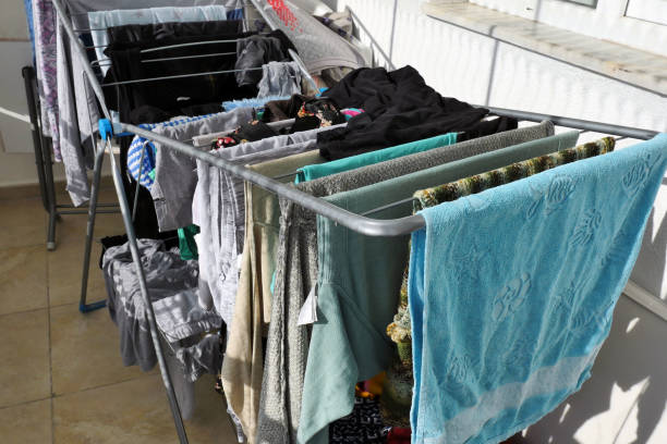 istock washed laundry dried on the balcony in the sun, 1285455582