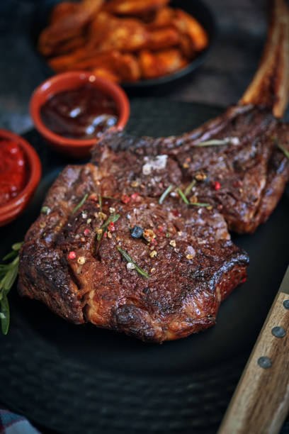 istock Tomahawk Steak with Country Potatoes 1285456493