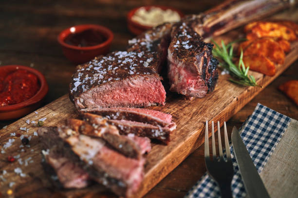 istock Tomahawk Steak with Country Potatoes 1285456611
