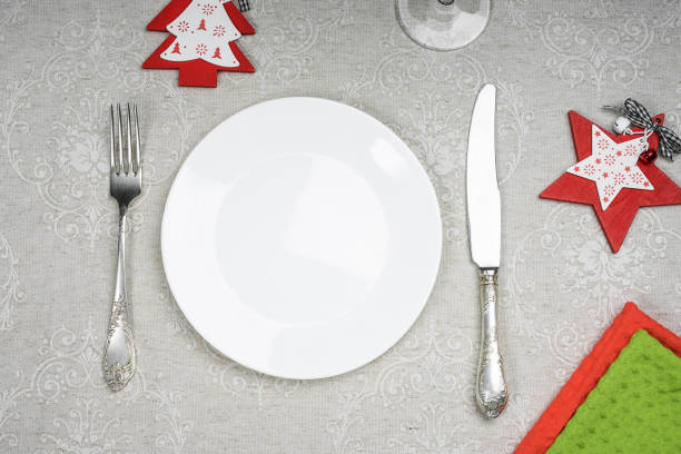 istock Empty plate with Christmas and New Year decoration for the holiday menu 1285456970