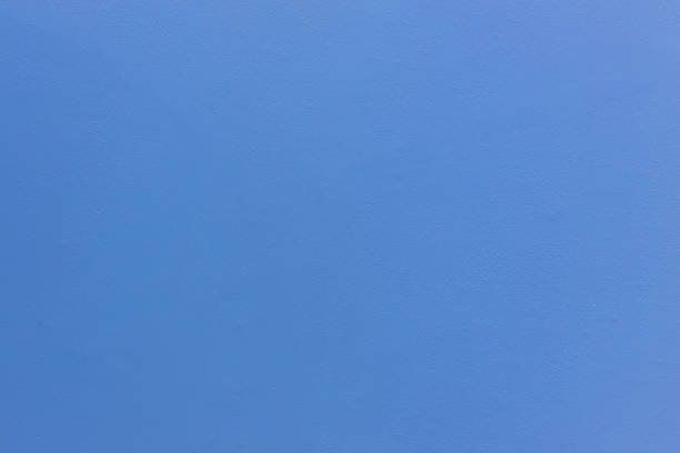 istock Blue sheet of cardboard paper with rough surface texture background. Textures on the blue wall use for background. Empty interior with blue wall or a blue floor. 1285458383