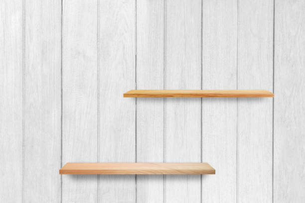 istock Empty wood shelf on white wooden wall texture background. 1285466860