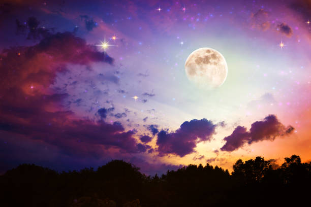 istock Blue abstract sky background with stars and full moon. 1285468826