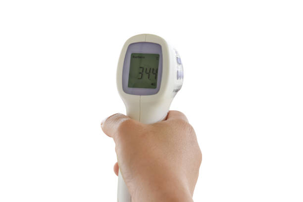 istock Hand holding digital infrared thermometer (thermometer gun) Isolated on white background 1285469950