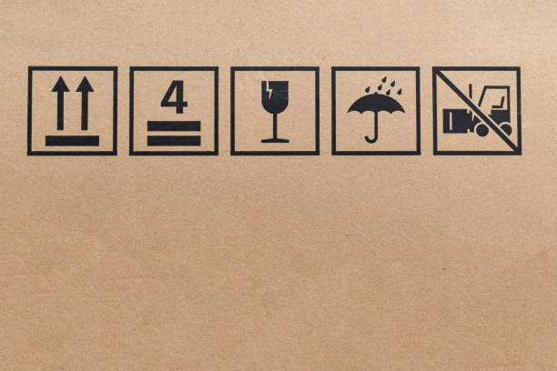 istock Black fragile sign icons on cardboard. 1285470117