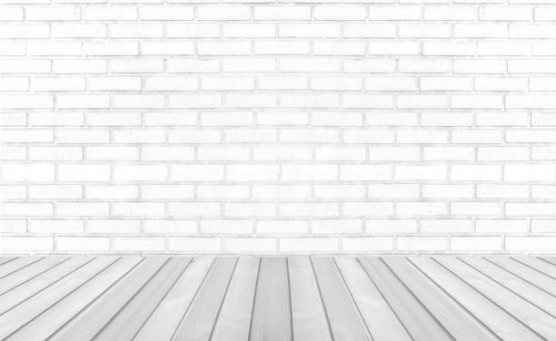 istock Vintage interior room with white wood floor and brick wall background 1285472674