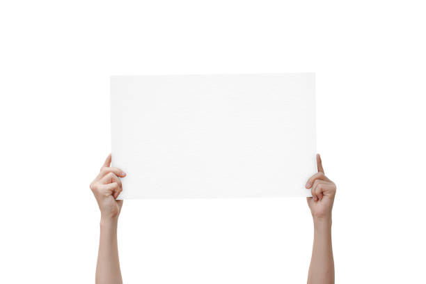 istock hands holding paper isolated on white background. with clipping path. 1285472812