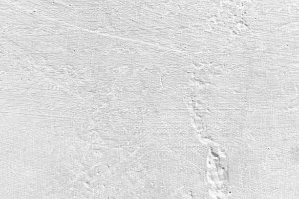 istock Abstract white grunge cement or concrete wall texture for background. 1285474194