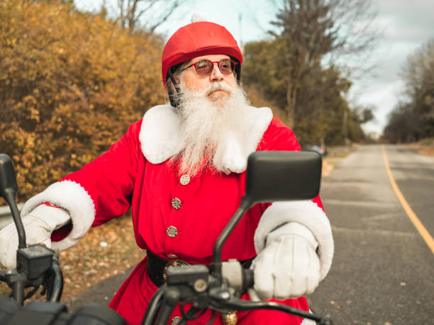istock Santa Claus on motorbike 1285476014