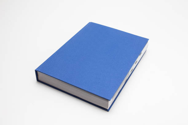 istock Blue book with no title on white background 1285476166