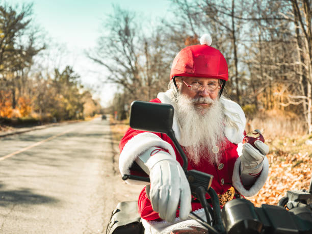 istock Santa Claus taking a break on the road 1285476321