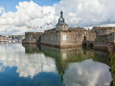 Clock tower and entrance to the walled city at Concarneau, Finistère department, Brittany, France