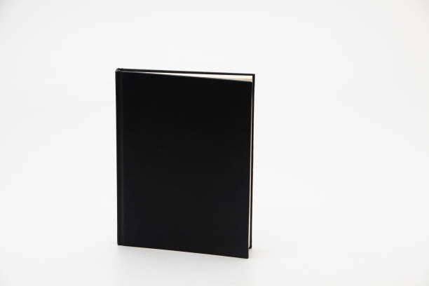 istock Stand Black blank book isolated on white background 1285476833