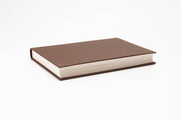 istock Brown color book on white background 1285477010