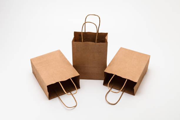 istock Brown paper shopping bags on whtie background 1285477068