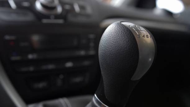 istock Driver Changing Gears with Manual Transmission Gear Stick 1285479467