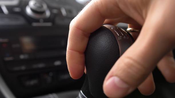 istock Driver Changing Gears with Manual Transmission Gear Stick 1285479475