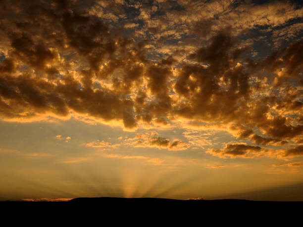 istock Dramatic light reflection against clouds with sunset in the Namib Desert 1285479542