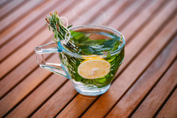A Cup of Healthy Herbal Tea on Wooden Table