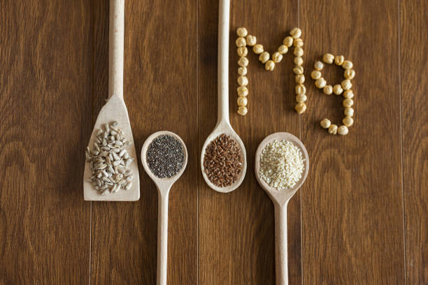 semillas como fuente de magnesio - sesame seed spoon variation fotografías e imágenes de stock
