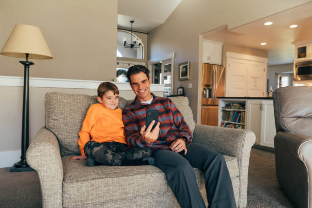 istock Family Using Devices in the Home 1285482539