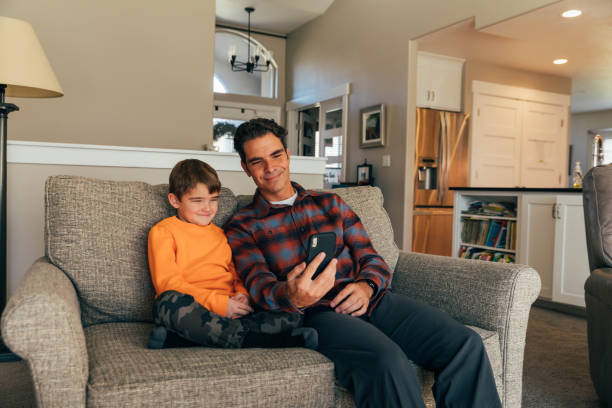 istock Family Using Devices in the Home 1285482565