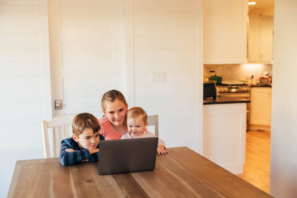 istock Family Using Devices in the Home 1285482568
