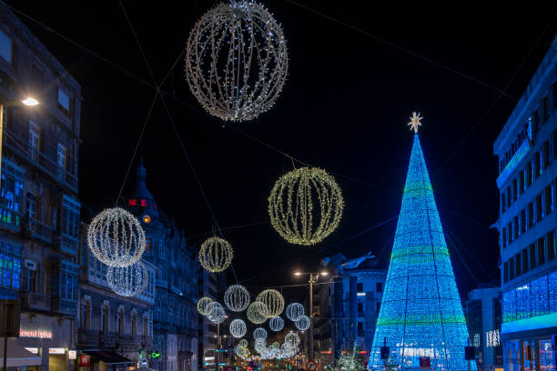 lights and Christmas decorations in the city of Vigo, Galicia, Spain Vigo, Pontevedra, Spain; December 2018: Enormous christmas tree in Vigo at night vigo stock pictures, royalty-free photos & images