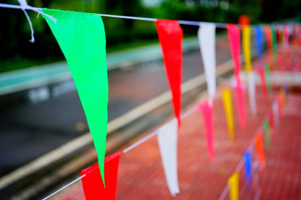 istock Colorful flags Festival background 1285482832