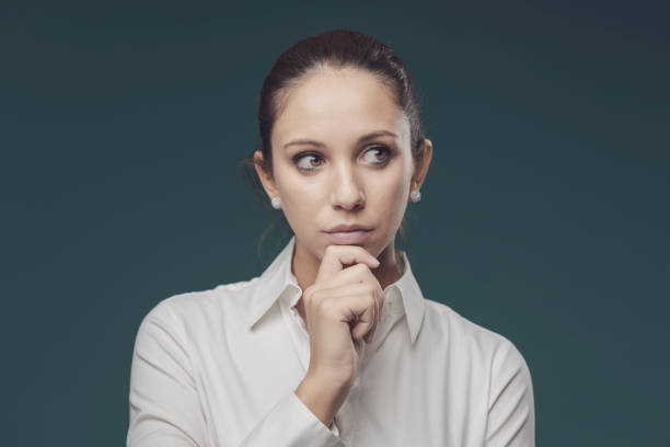 istock Pensive young woman thinking 1285484060
