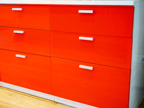 Close-up Red Drawer with Modern Kitchen