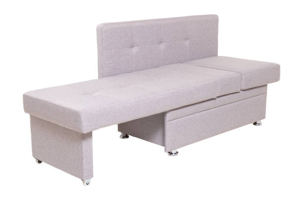 istock modern grey extended fabric sofa isolated, side view. contemporary couch 1285484129