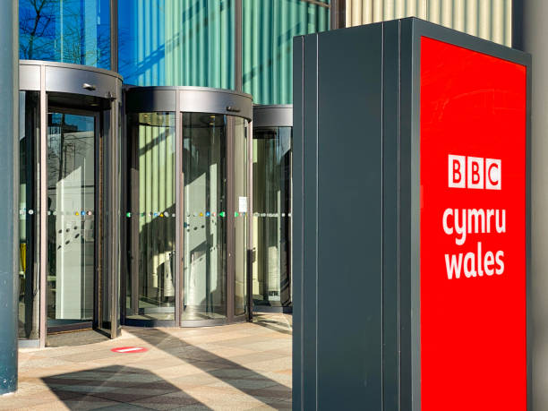 Entrance to the new BBC Wales headquarters in Cardiff Cardiff, Wales - November 2020: Sign outside the entrance to the new BBC Wales television studios in Cardiff city centre bbc photos stock pictures, royalty-free photos & images
