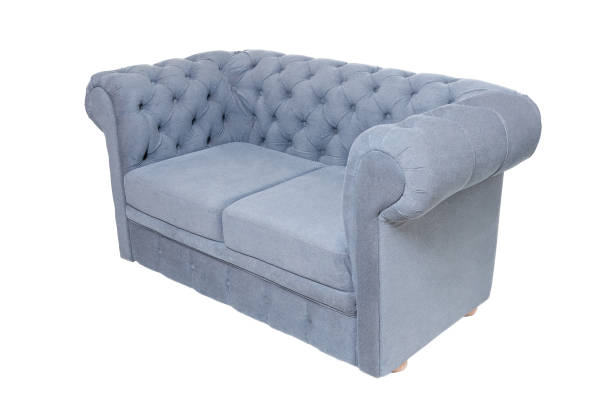 istock vintage grey or blue fabric sofa isolated on white background, side view 1285484643