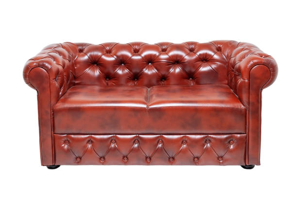 istock brown luxurious leather office sofa isolated on white background, front view 1285484694