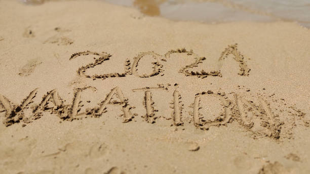 istock handmade written  VACATION on the sea beach 1285485070