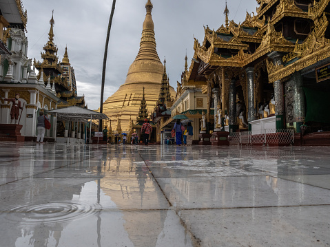 11/07/2019 Schwedagon pagoda, Yangon, Myanmar\nReflection on the tiled floor, water