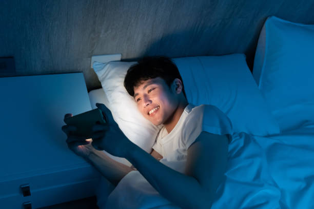 istock man watch video on smartphone 1285486200