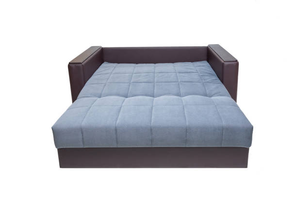 istock brown and blue, fabric and leather sofa isolated on white. Modern soft couch 1285486349