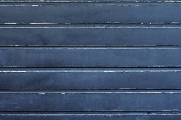 istock Blue-grey wooden planks background texture 1285486374