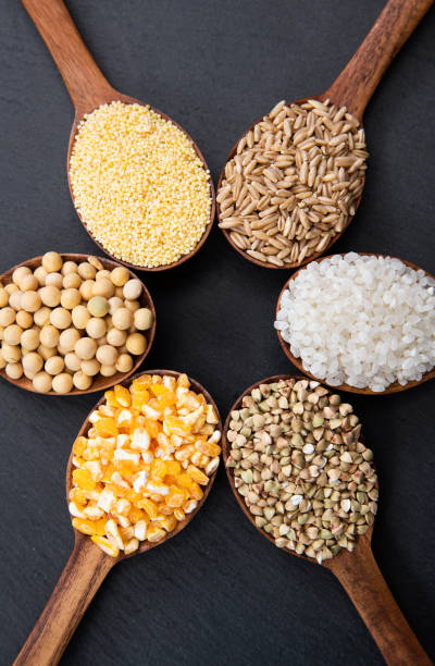 istock Wooden spoon is filled with grain 1285489051