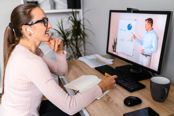 istock A woman in office is watching online classes 1285491095