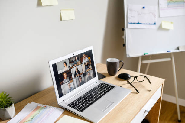 istock video call with a many people together on screen 1285491108