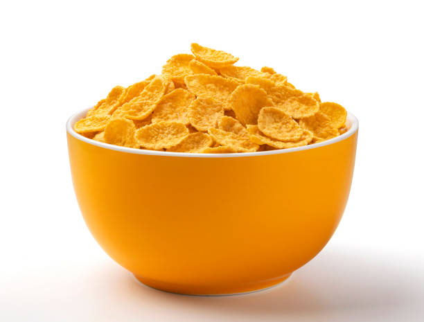 istock Corn flakes, bowl of cereal breakfast on white background, full depth of field 1285492418