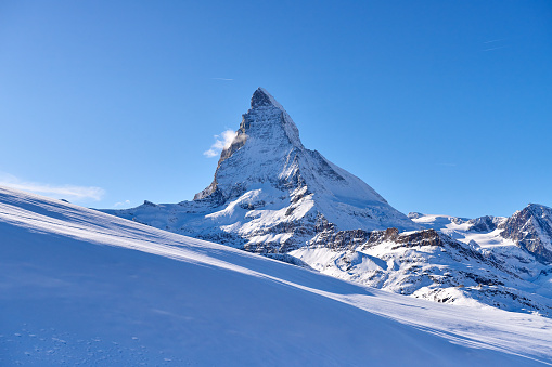 Close-up of Matterhorn and snowfield at winter sunny day, Switzerland Alps.